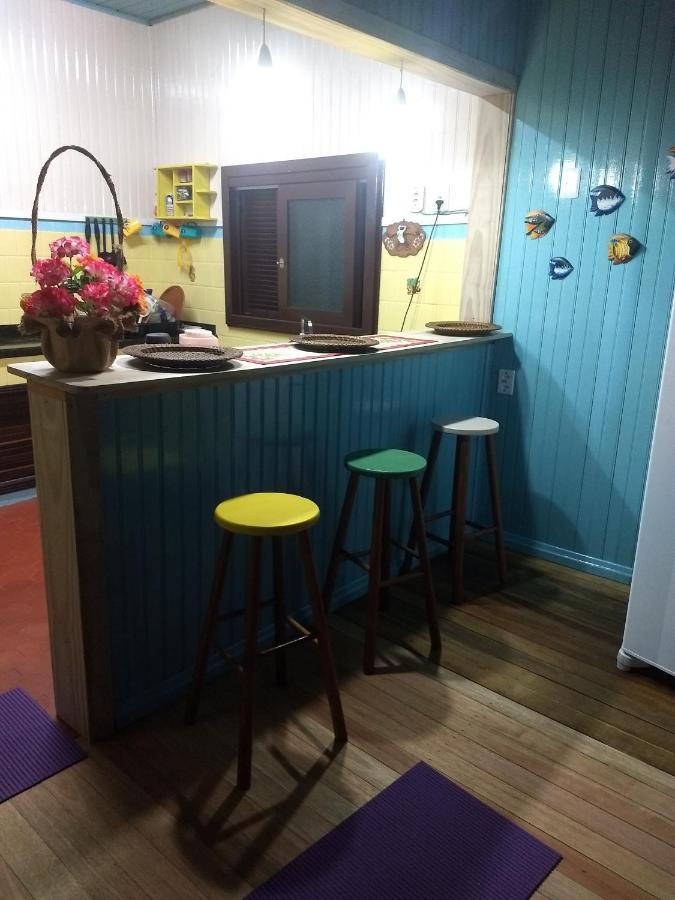 Quarto Triplo com Banheiro Compartilhado