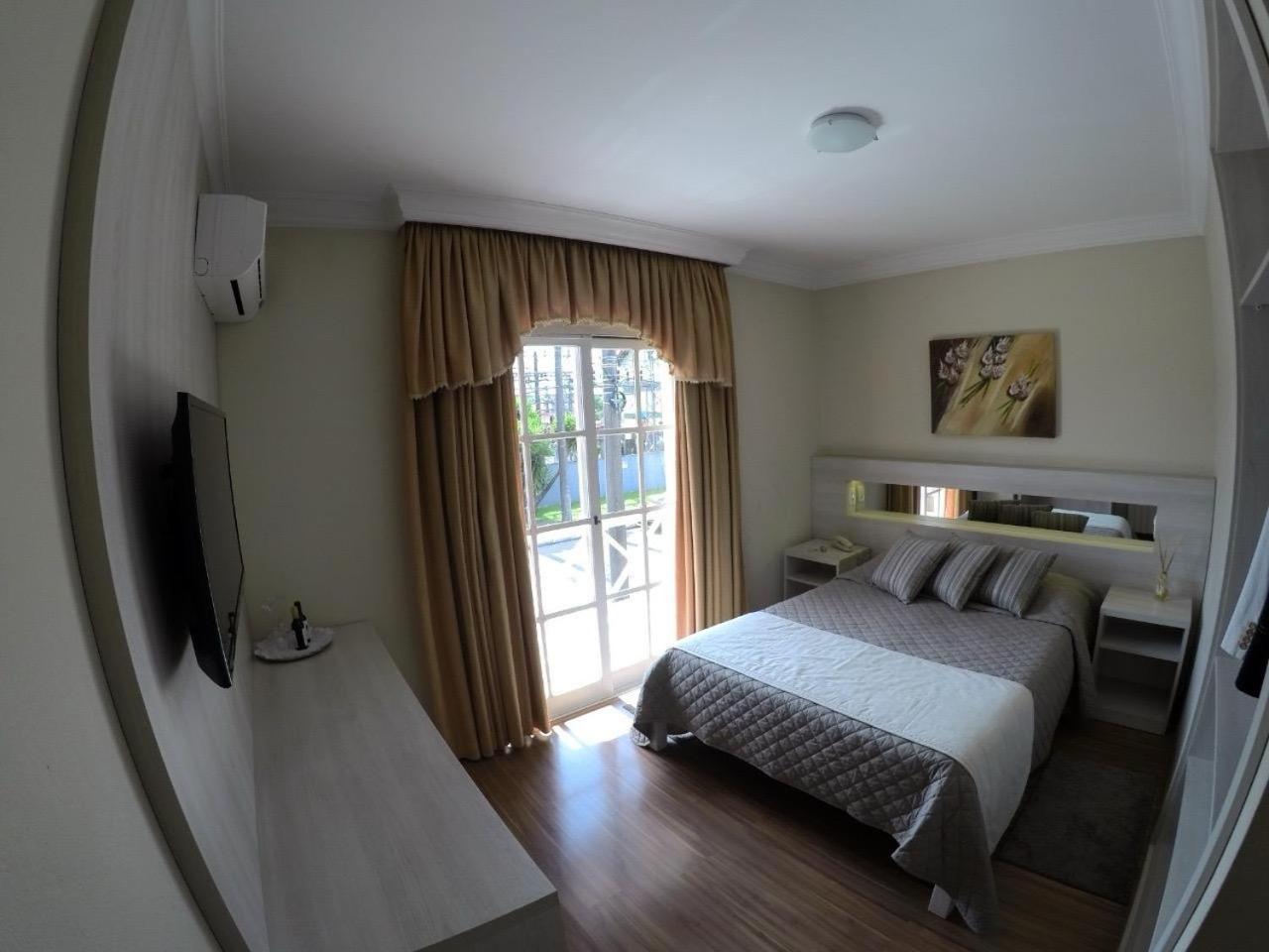Quarto Duplo Deluxe com Varanda,1594680474:JPEG