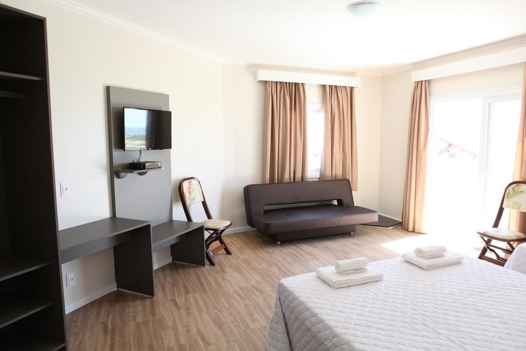 Quarto Triplo Superior com Vista do Mar