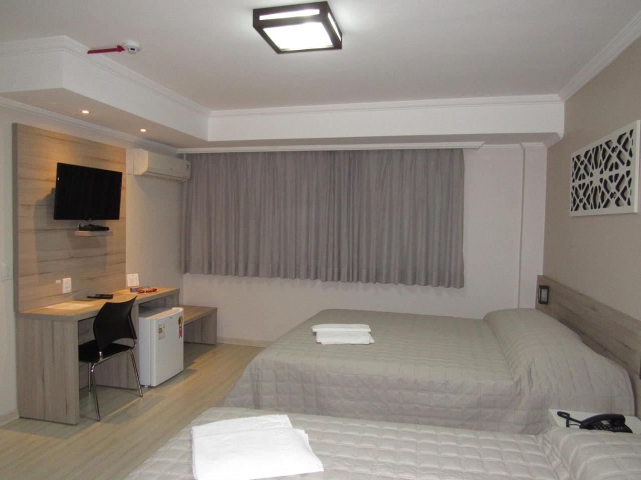 Quarto Deluxe com Cama de Casal ou 2 de Solteiro